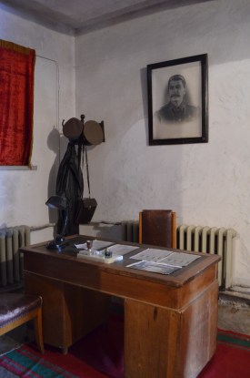 A replica of Soviet interrogation rooms - look who's smiling down on us from the portrait!
